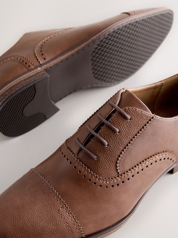 Next Veterschoen in Bruin