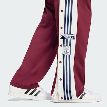 ADIDAS ORIGINALS Voľný strih Nohavice 'Adibreak' - Červená