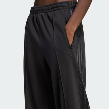 Loosefit Pantaloni sportivi 'Firebird' di ADIDAS ORIGINALS in nero