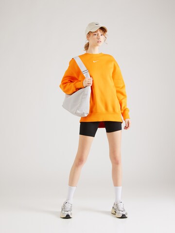 Nike Sportswear Collegepaita 'PHOENIX FLEECE' värissä oranssi