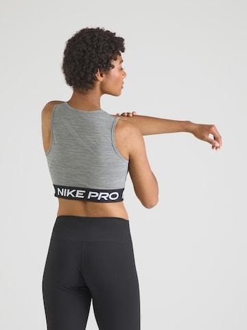 NIKE Спортен топ 'NIKE PRO 365' в сиво: отзад
