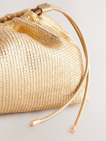 Next Clutch in Goud