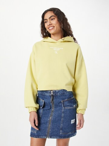 Sweat-shirt Calvin Klein Jeans en jaune : devant
