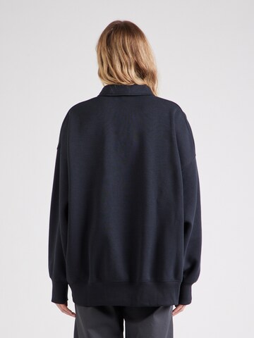 Nike Sportswear - Sudadera 'Phoenix Fleece' en negro