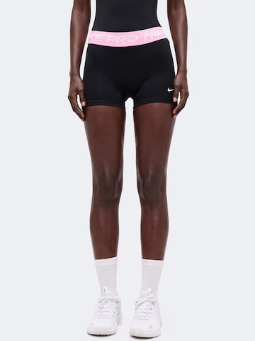 NIKESkinny Sportske hlače 'NP 365' - crna boja: prednji dio