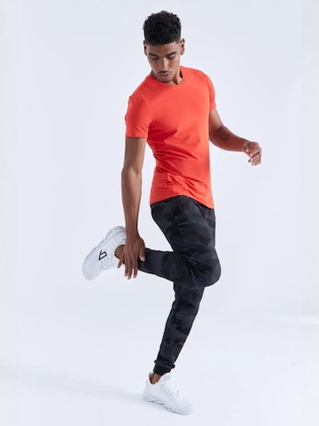 Skinny Pantaloni sportivi di Tommy Life in nero