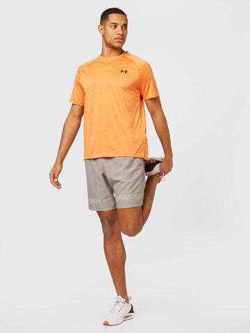 Regular Pantaloni sport de la UNDER ARMOUR pe bej