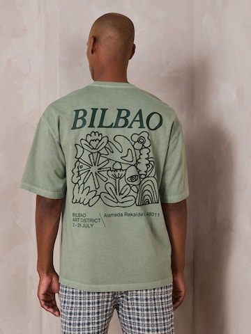 Next T-Shirt in Grün: Vorderseite