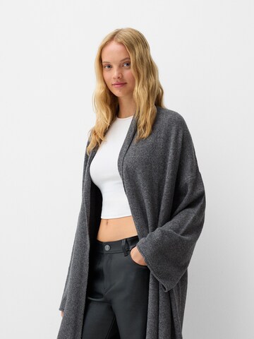 Bershka Stickad kappa i grå