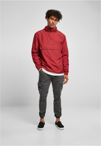 Veste mi-saison Urban Classics en rouge