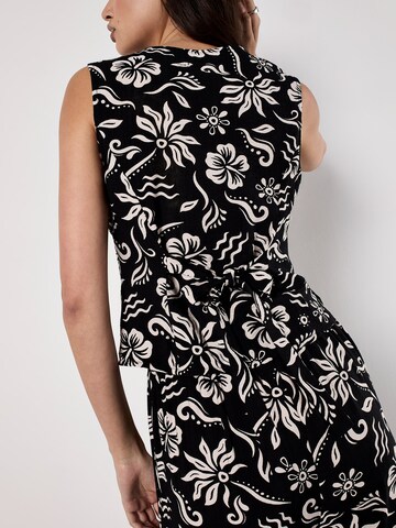 Haut Apricot en noir