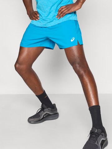 regular Pantaloni sportivi di ASICS in blu