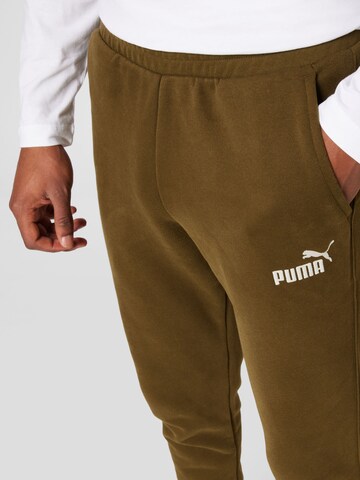 PUMA Zúžený Sportovní kalhoty – zelená