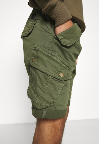 ALPHA INDUSTRIES Regular Cargo Pants 'Combat' in Green