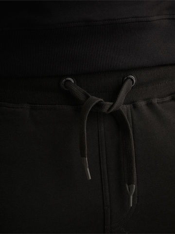 Loosefit Pantaloni sportivi 'Airstreamer cargo sweatpants' di PME Legend in nero