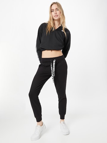 DKNY Performance Tapered Workout Pants in Black