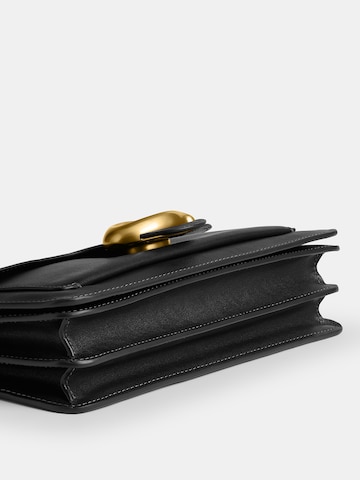 Borsa a tracolla di COACH in nero