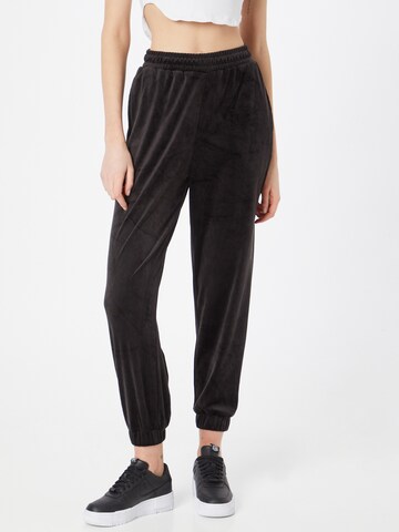 Urban Classics Tapered Pants in Black: front