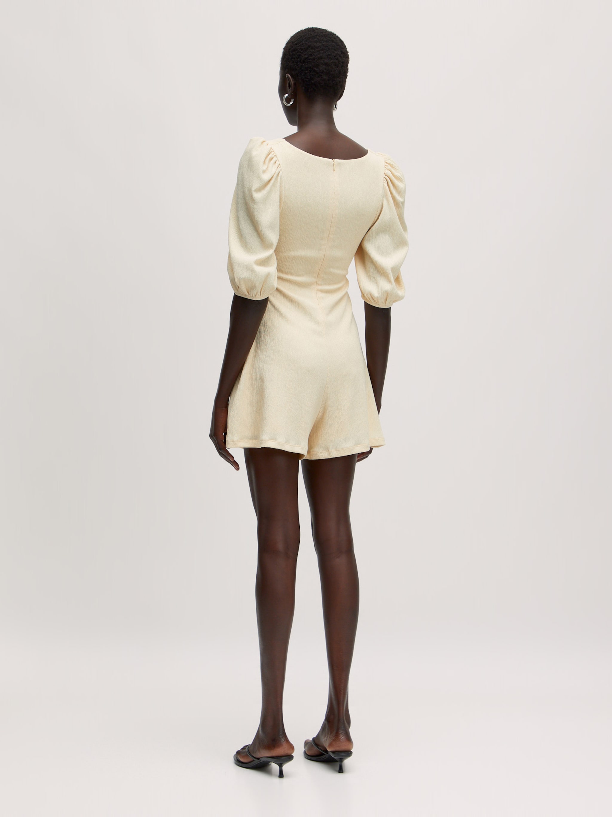 EDITED Produkte Jumpsuit 'Xylia' beige