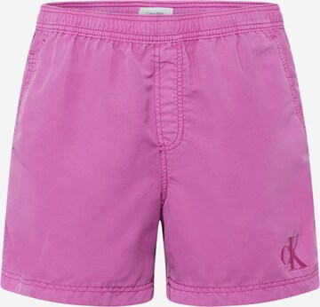 Shorts de bain TOMMY HILFIGER en violet : devant