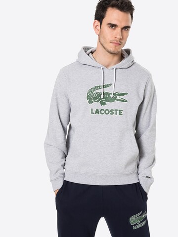 Sweat-shirt LACOSTE en gris : devant