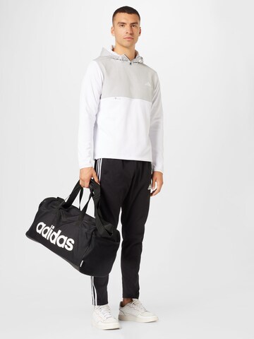 ADIDAS SPORTSWEAR Slimfit Παντελόνι φόρμας 'Essentials' σε μαύρο