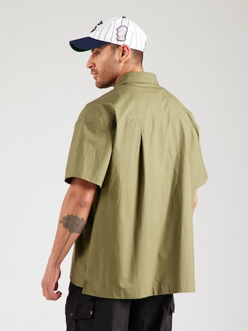 Fit confort Chemise 'CLUB' Nike Sportswear en vert