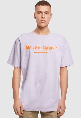 T-Shirt 'Hustle' MT Upscale en violet : devant