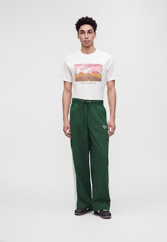 Nike Sportswear Loosefit Nadrág 'Club' - zöld: elől