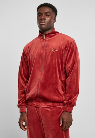 Effilé Pantalon Karl Kani en rouge : devant