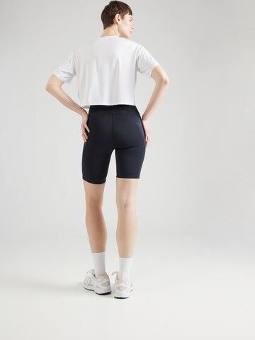 Skinny Pantaloni sport de la Röhnisch pe negru