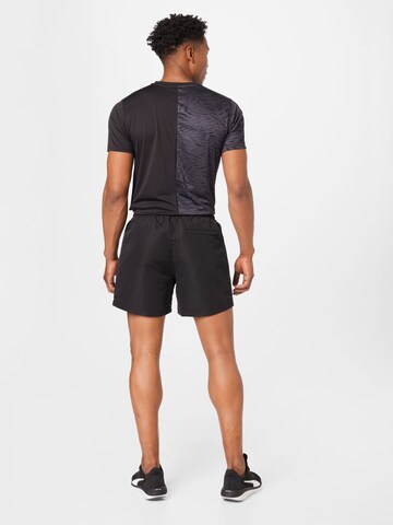 PUMA Regular Broek in Zwart