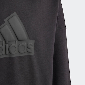 ADIDAS SPORTSWEAR Urheilullinen collegepaita 'Future Icons' värissä musta