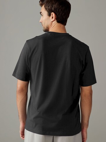 T-Shirt Next en noir