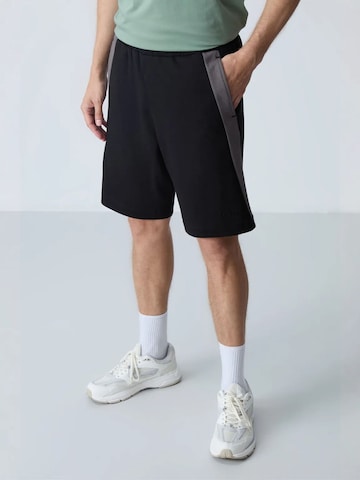 Regular Pantalon Tommy Life en noir
