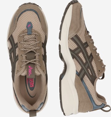 Baskets basses ASICS SportStyle en gris