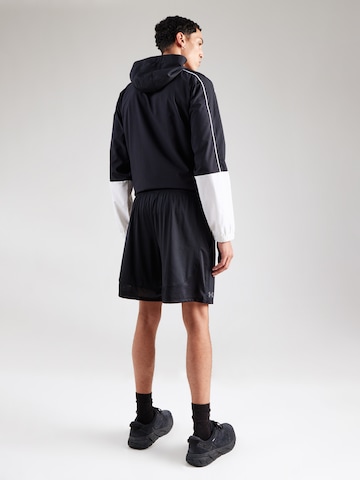 UNDER ARMOUR Regular Sportbyxa i svart