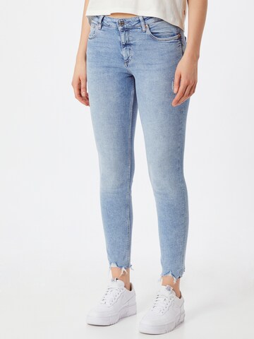 Skinny Jeans de la QS pe albastru: față