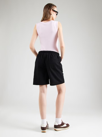 ELLESSE Voľný strih Nohavice 'Cnyk' - Čierna