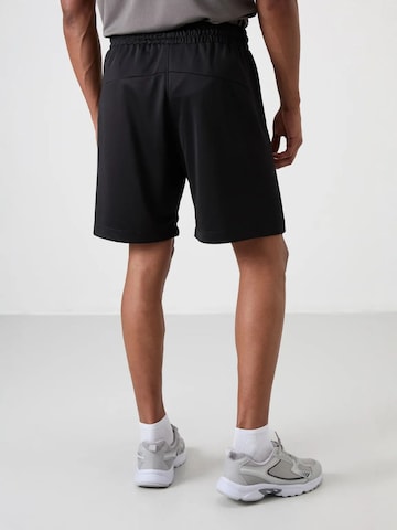 Regular Pantalon de sport Tommy Life en noir