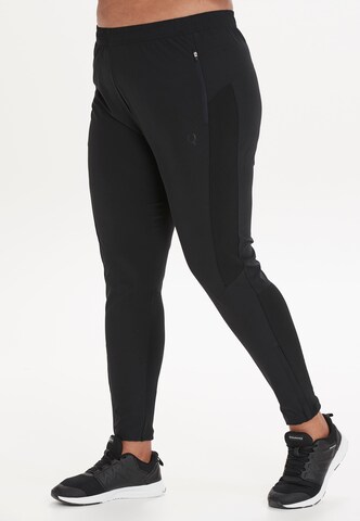 Q by Endurance Slimfit Leggings 'ISABELY W' in Zwart: voorkant