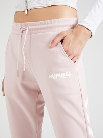 Tapered Pantaloni sportivi 'Legacy' di Hummel in rosa