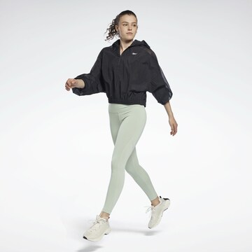 Skinny Pantalon de sport 'Beyond' Reebok en vert