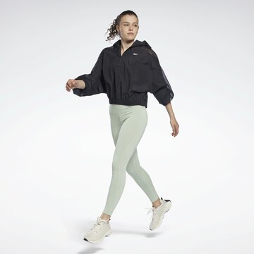 Reebok - Skinny Calças de desporto 'Beyond' em verde