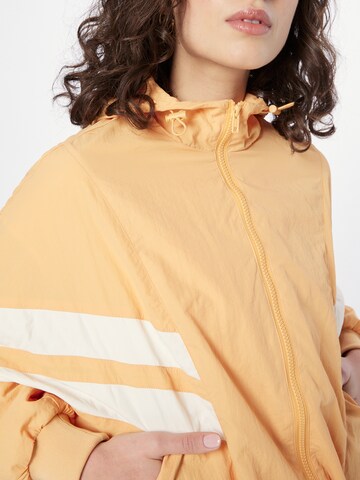 Urban Classics Overgangsjakke 'Crinkle Batwing' i oransje