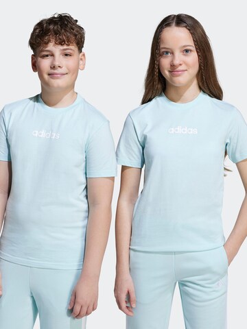 ADIDAS SPORTSWEAR - Camisa funcionais em azul