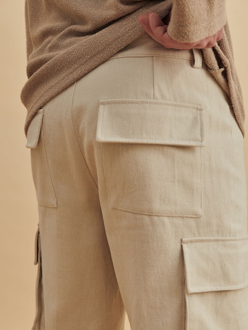 DAN FOX APPAREL Tapered Cargo Pants 'Hasan' in Beige