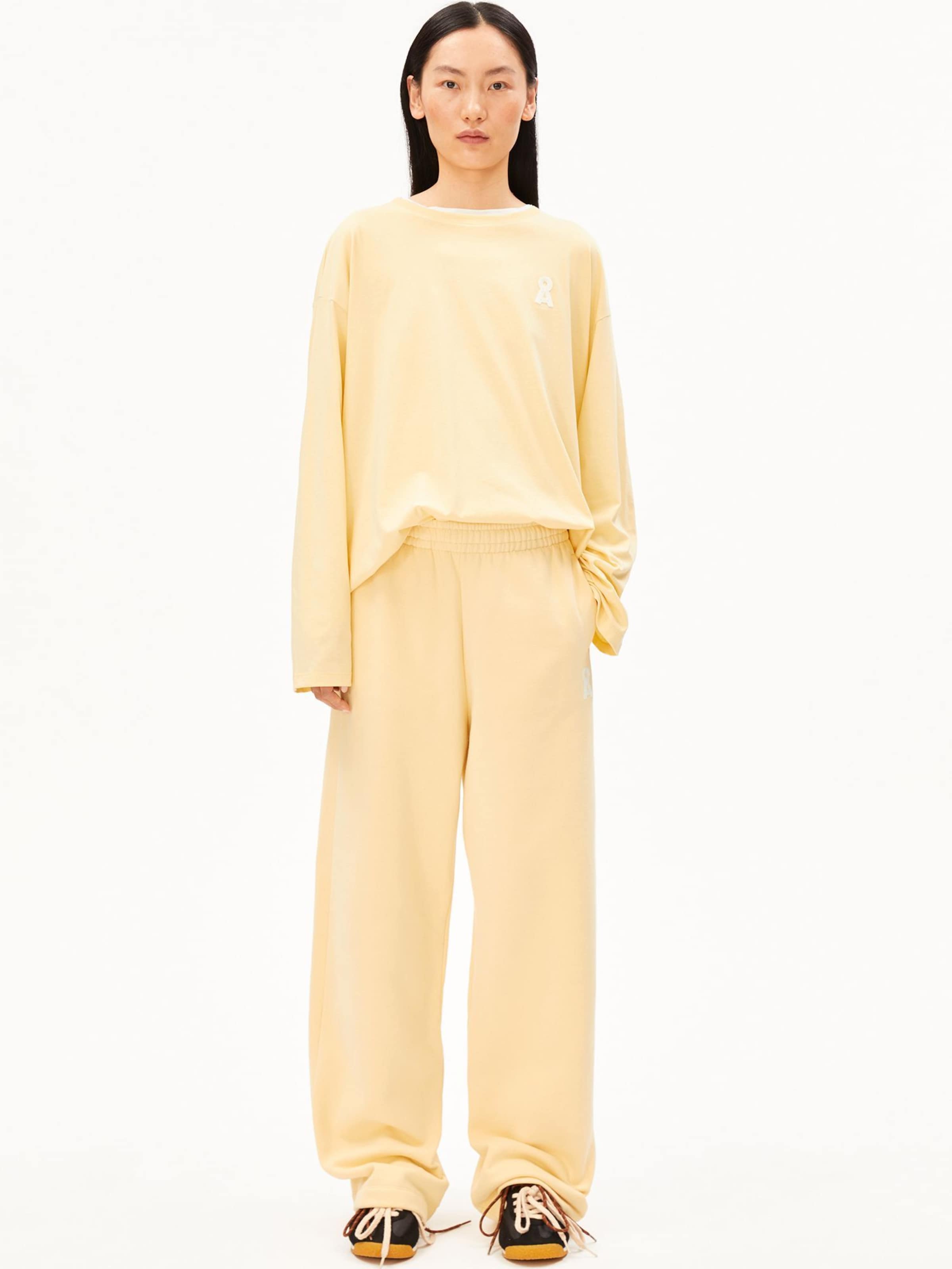 ARMEDANGELS Loose fit Trousers in Yellow: front