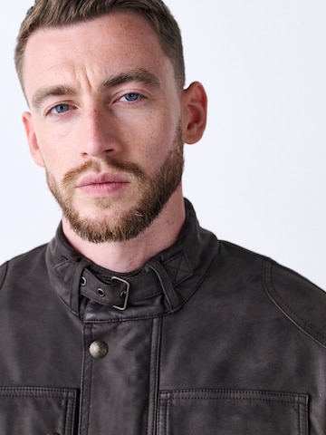 Next Tussenjas in Bruin