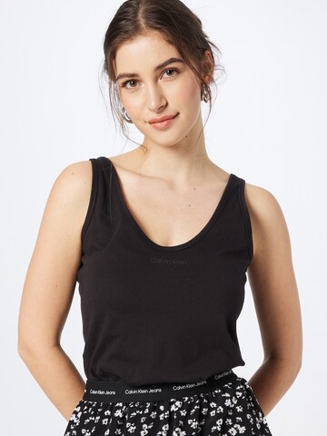 Calvin Klein - Top en negro: frente